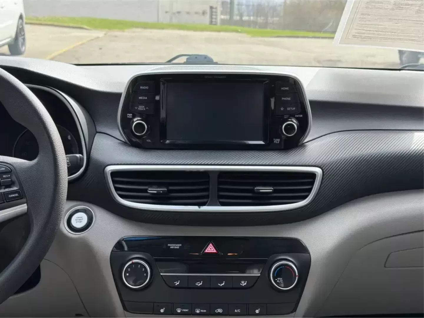 2019 Hyundai Tucson Value (KM8J33A41KU) with an Nu 2L I-4 gasoline direct injection engine, 6A transmission, located at 8750 N County Rd 25A, Piqua, OH, 45356, (937) 908-9800, 40.164391, -84.232513 - Picture your next Ohio weekend: loading up the cooler, tossing sports gear in the back, and cruising from Piqua to a family cookout or a quick getaway-without stressing about space, comfort, or the road ahead. This **2019 Hyundai Tucson Value** in **White Pearl** is the kind of compact SUV that fits - Photo#13