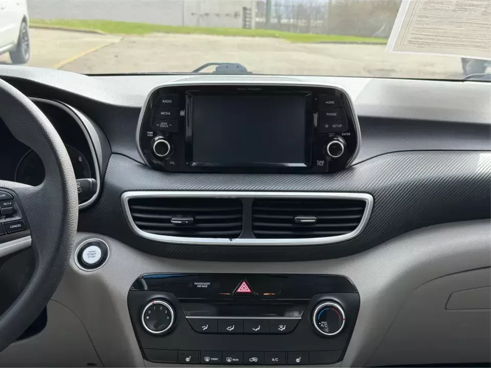 2019 Hyundai Tucson Value (KM8J33A41KU) with an Nu 2L I-4 gasoline direct injection engine, 6A transmission, located at 8750 N County Rd 25A, Piqua, OH, 45356, (937) 908-9800, 40.164391, -84.232513 - Picture your next Ohio weekend: loading up the cooler, tossing sports gear in the back, and cruising from Piqua to a family cookout or a quick getaway-without stressing about space, comfort, or the road ahead. This **2019 Hyundai Tucson Value** in **White Pearl** is the kind of compact SUV that fits - Photo#13