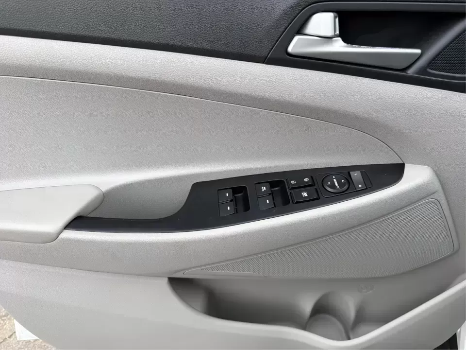 2019 Hyundai Tucson Value (KM8J33A41KU) with an Nu 2L I-4 gasoline direct injection engine, 6A transmission, located at 8750 N County Rd 25A, Piqua, OH, 45356, (937) 908-9800, 40.164391, -84.232513 - Picture your next Ohio weekend: loading up the cooler, tossing sports gear in the back, and cruising from Piqua to a family cookout or a quick getaway-without stressing about space, comfort, or the road ahead. This **2019 Hyundai Tucson Value** in **White Pearl** is the kind of compact SUV that fits - Photo#18