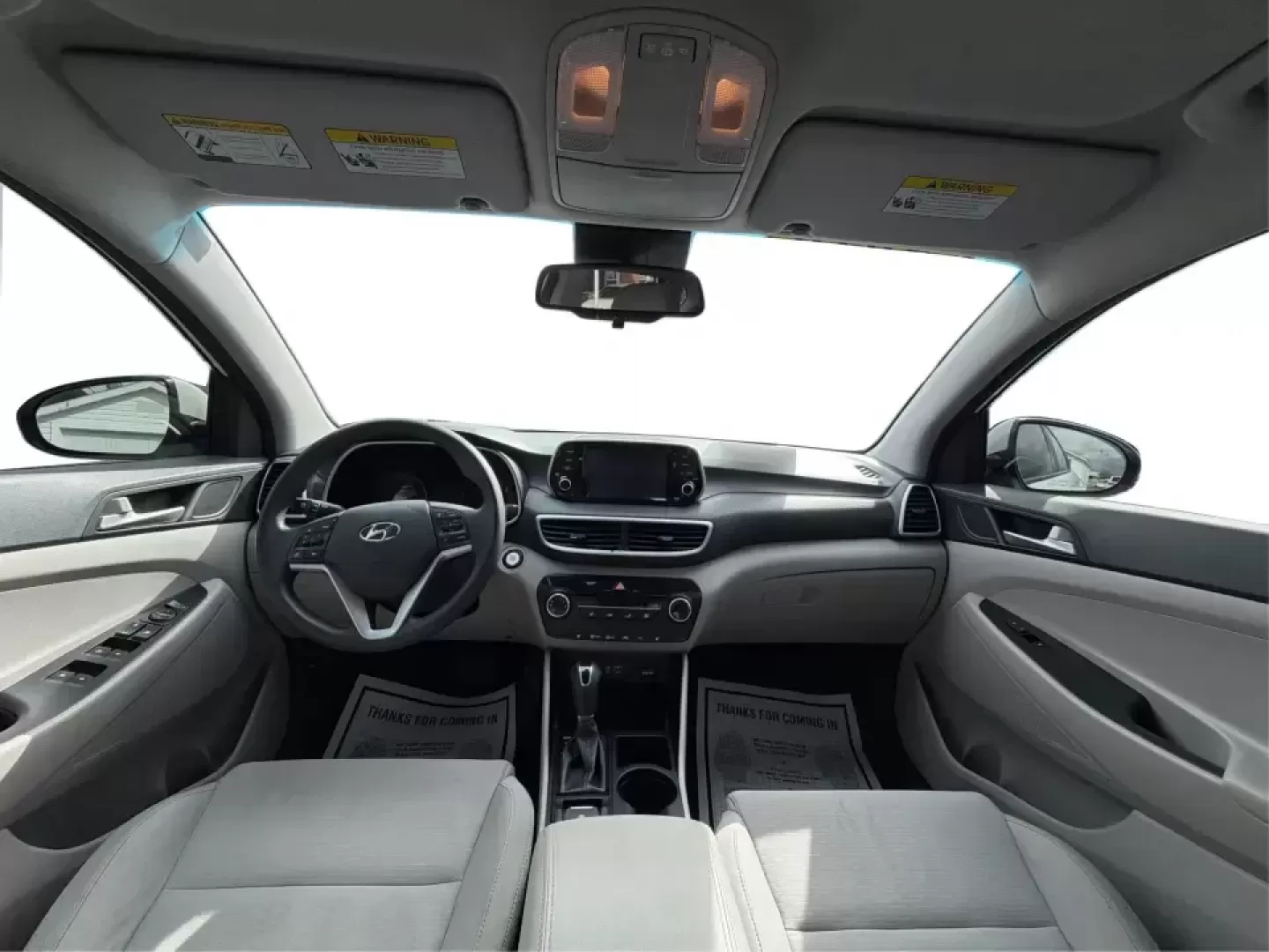 2019 Hyundai Tucson Value (KM8J33A41KU) with an Nu 2L I-4 gasoline direct injection engine, 6A transmission, located at 8750 N County Rd 25A, Piqua, OH, 45356, (937) 908-9800, 40.164391, -84.232513 - Picture your next Ohio weekend: loading up the cooler, tossing sports gear in the back, and cruising from Piqua to a family cookout or a quick getaway-without stressing about space, comfort, or the road ahead. This **2019 Hyundai Tucson Value** in **White Pearl** is the kind of compact SUV that fits - Photo#21