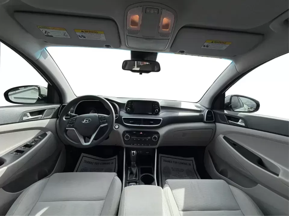 2019 Hyundai Tucson Value (KM8J33A41KU) with an Nu 2L I-4 gasoline direct injection engine, 6A transmission, located at 8750 N County Rd 25A, Piqua, OH, 45356, (937) 908-9800, 40.164391, -84.232513 - Picture your next Ohio weekend: loading up the cooler, tossing sports gear in the back, and cruising from Piqua to a family cookout or a quick getaway-without stressing about space, comfort, or the road ahead. This **2019 Hyundai Tucson Value** in **White Pearl** is the kind of compact SUV that fits - Photo#21