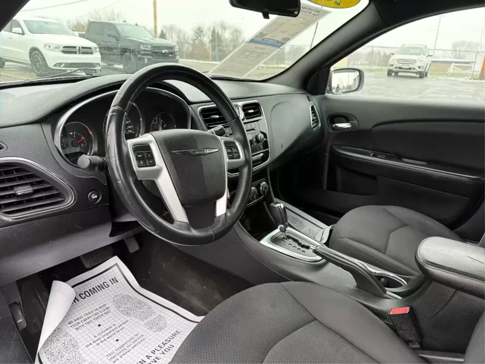 2013 Chrysler 200 Touring (1C3CCBBG4DN) with an 3.6L V6 DOHC 24V FFV engine, 6-Speed Automatic transmission, located at 4508 South Dixie Dr, Moraine, OH, 45439, (937) 908-9800, 39.689976, -84.218452 - Need a comfortable, reliable sedan for the daily commute down South Dixie Drive, quick runs to the Dayton Mall area, or weekend drives toward RiverScape MetroPark? This 2013 Chrysler 200 Touring in Bright White Clearcoat delivers the smooth, practical lifestyle fit many Moraine, OH drivers want-room - Photo#9