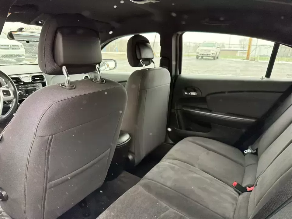 2013 Chrysler 200 Touring (1C3CCBBG4DN) with an 3.6L V6 DOHC 24V FFV engine, 6-Speed Automatic transmission, located at 4508 South Dixie Dr, Moraine, OH, 45439, (937) 908-9800, 39.689976, -84.218452 - Need a comfortable, reliable sedan for the daily commute down South Dixie Drive, quick runs to the Dayton Mall area, or weekend drives toward RiverScape MetroPark? This 2013 Chrysler 200 Touring in Bright White Clearcoat delivers the smooth, practical lifestyle fit many Moraine, OH drivers want-room - Photo#10