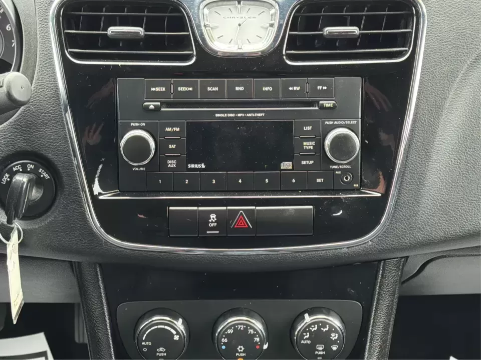 2013 Chrysler 200 Touring (1C3CCBBG4DN) with an 3.6L V6 DOHC 24V FFV engine, 6-Speed Automatic transmission, located at 4508 South Dixie Dr, Moraine, OH, 45439, (937) 908-9800, 39.689976, -84.218452 - Need a comfortable, reliable sedan for the daily commute down South Dixie Drive, quick runs to the Dayton Mall area, or weekend drives toward RiverScape MetroPark? This 2013 Chrysler 200 Touring in Bright White Clearcoat delivers the smooth, practical lifestyle fit many Moraine, OH drivers want-room - Photo#13