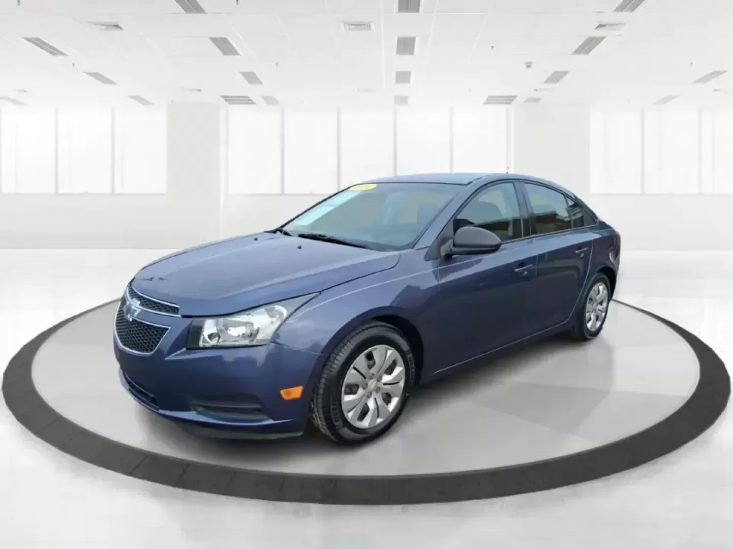 2014 Chevrolet Cruze LS Auto (1G1PA5SG7E7) with an ECOTEC 1.8L I-4 DOHC engine, 6-Speed Automatic transmission, located at 401 Woodman Dr, Riverside, OH, 45431, (937) 908-9800, 39.760899, -84.123421 - Picture a dependable daily commuter that still feels comfortable for weekend errands, school drop-offs, and the occasional road trip down I-675 or US-35-this 2014 Chevrolet Cruze LS Auto is the kind of practical sedan that fits real life in the Dayton area. Finished in Atlantis Blue Metallic, it's e - Photo#8