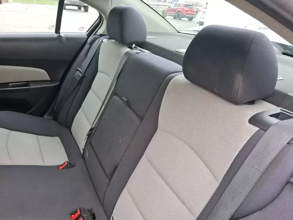 2014 Chevrolet Cruze LS Auto (1G1PA5SG7E7) with an ECOTEC 1.8L I-4 DOHC engine, 6-Speed Automatic transmission, located at 401 Woodman Dr, Riverside, OH, 45431, (937) 908-9800, 39.760899, -84.123421 - Picture a dependable daily commuter that still feels comfortable for weekend errands, school drop-offs, and the occasional road trip down I-675 or US-35-this 2014 Chevrolet Cruze LS Auto is the kind of practical sedan that fits real life in the Dayton area. Finished in Atlantis Blue Metallic, it's e - Photo#10