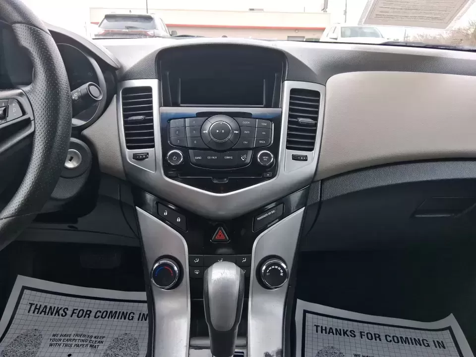 2014 Chevrolet Cruze LS Auto (1G1PA5SG7E7) with an ECOTEC 1.8L I-4 DOHC engine, 6-Speed Automatic transmission, located at 401 Woodman Dr, Riverside, OH, 45431, (937) 908-9800, 39.760899, -84.123421 - Picture a dependable daily commuter that still feels comfortable for weekend errands, school drop-offs, and the occasional road trip down I-675 or US-35-this 2014 Chevrolet Cruze LS Auto is the kind of practical sedan that fits real life in the Dayton area. Finished in Atlantis Blue Metallic, it's e - Photo#13