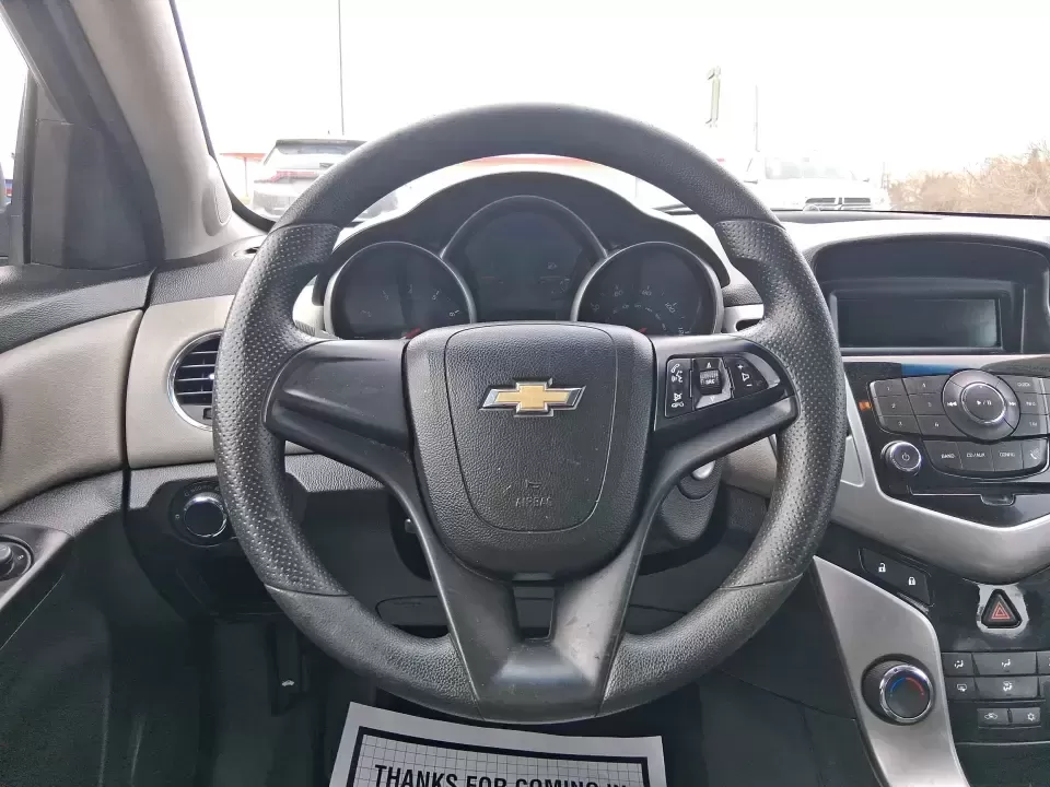 2014 Chevrolet Cruze LS Auto (1G1PA5SG7E7) with an ECOTEC 1.8L I-4 DOHC engine, 6-Speed Automatic transmission, located at 401 Woodman Dr, Riverside, OH, 45431, (937) 908-9800, 39.760899, -84.123421 - Picture a dependable daily commuter that still feels comfortable for weekend errands, school drop-offs, and the occasional road trip down I-675 or US-35-this 2014 Chevrolet Cruze LS Auto is the kind of practical sedan that fits real life in the Dayton area. Finished in Atlantis Blue Metallic, it's e - Photo#16