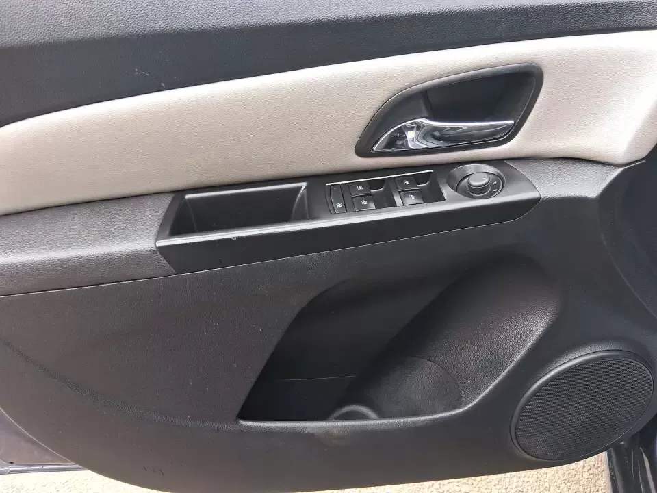 2014 Chevrolet Cruze LS Auto (1G1PA5SG7E7) with an ECOTEC 1.8L I-4 DOHC engine, 6-Speed Automatic transmission, located at 401 Woodman Dr, Riverside, OH, 45431, (937) 908-9800, 39.760899, -84.123421 - Picture a dependable daily commuter that still feels comfortable for weekend errands, school drop-offs, and the occasional road trip down I-675 or US-35-this 2014 Chevrolet Cruze LS Auto is the kind of practical sedan that fits real life in the Dayton area. Finished in Atlantis Blue Metallic, it's e - Photo#18