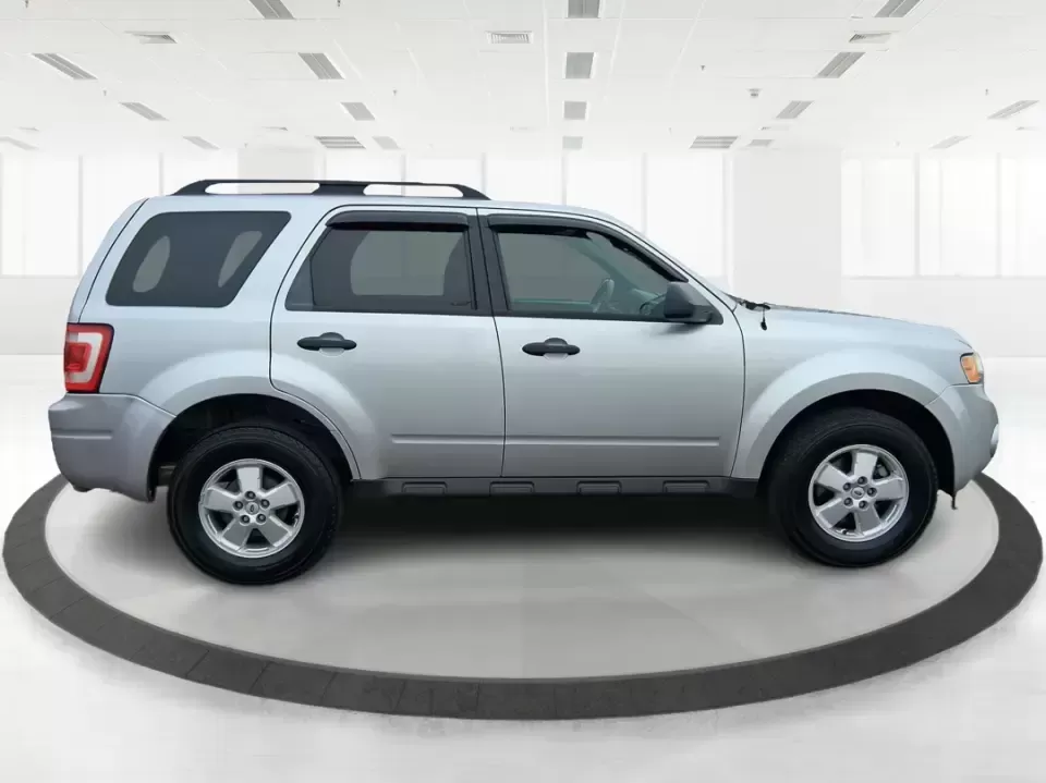 2012 Ford Escape XLT 4WD (1FMCU9D70CK) with an 2.5L L4 DOHC 16V engine, 6-Speed Automatic transmission, located at 880 E. National Road, Vandalia, OH, 45377, (937) 908-9800, 39.891918, -84.183594 - Pack up the kids, the dog, and a weekend's worth of gear-this 2012 Ford Escape XLT 4WD is the kind of SUV that fits real life in Vandalia. Whether you're commuting down I75 toward Dayton, running errands along National Road, or heading out for a quick getaway to Taylorsville MetroPark, the Escape's- Photo#1
