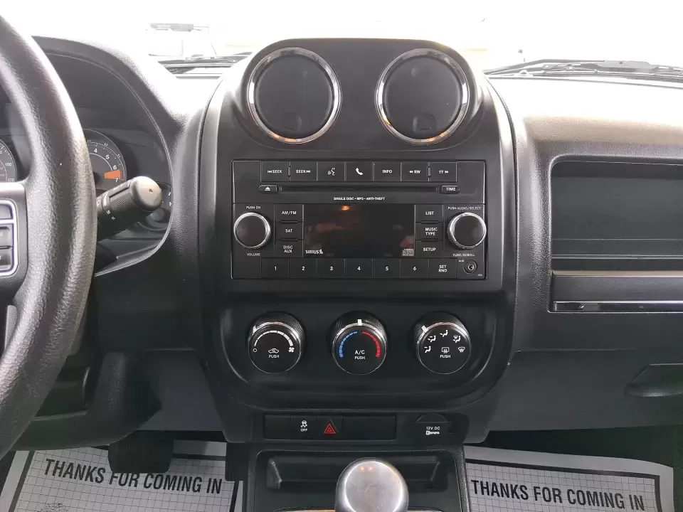 2016 Jeep Patriot Sport (1C4NJRBB2GD) with an 2.4L I-4 DOHC engine, located at 1230 East Main St, Xenia, OH, 45385, (937) 908-9800, 39.688026, -83.910172 - Ready for weekend escapes to John Bryan State Park, a confident commute down US-35, or a practical SUV that can handle Ohio's surprise weather? This 2016 Jeep Patriot Sport in Billet Silver Metallic Clearcoat is built for drivers who want everyday flexibility-room for errands and gear, sure-footed c - Photo#13