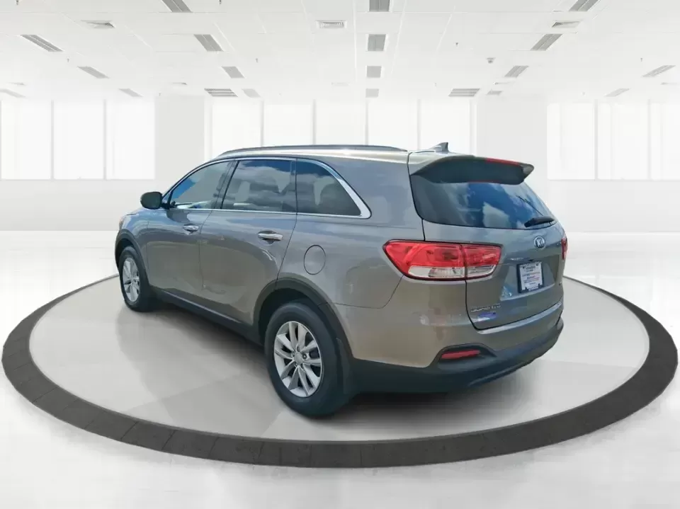 2018 Kia Sorento 2.4L LX (5XYPG4A33JG) with an 2.4L I-4 gasoline direct injection engine, 6A transmission, located at 1184 Kauffman Ave, Fairborn, OH, 45324, (937) 908-9800, 39.807072, -84.030914 - Need one SUV that can handle school drop-offs in the morning, a long commute down I675 in the afternoon, and a weekend road trip to the National Museum of the U.S. Air Force without feeling cramped? This 2018 Kia Sorento LX is built for real-life schedules-comfortable, practical, and ready for every - Photo#4