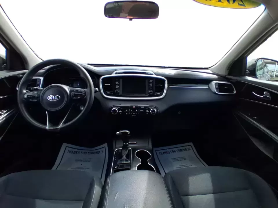 2018 Kia Sorento 2.4L LX (5XYPG4A33JG) with an 2.4L I-4 gasoline direct injection engine, 6A transmission, located at 1184 Kauffman Ave, Fairborn, OH, 45324, (937) 908-9800, 39.807072, -84.030914 - Need one SUV that can handle school drop-offs in the morning, a long commute down I675 in the afternoon, and a weekend road trip to the National Museum of the U.S. Air Force without feeling cramped? This 2018 Kia Sorento LX is built for real-life schedules-comfortable, practical, and ready for every - Photo#19