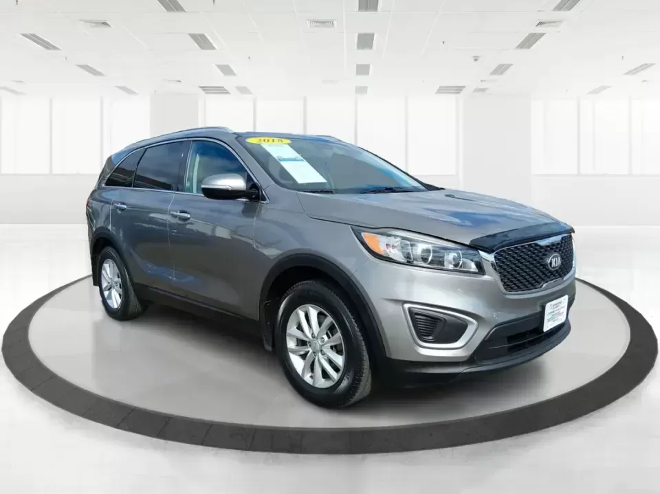 2018 Kia Sorento 2.4L LX (5XYPG4A33JG) with an 2.4L I-4 gasoline direct injection engine, 6A transmission, located at 1184 Kauffman Ave, Fairborn, OH, 45324, (937) 908-9800, 39.807072, -84.030914 - Need one SUV that can handle school drop-offs in the morning, a long commute down I675 in the afternoon, and a weekend road trip to the National Museum of the U.S. Air Force without feeling cramped? This 2018 Kia Sorento LX is built for real-life schedules-comfortable, practical, and ready for every - Photo#0