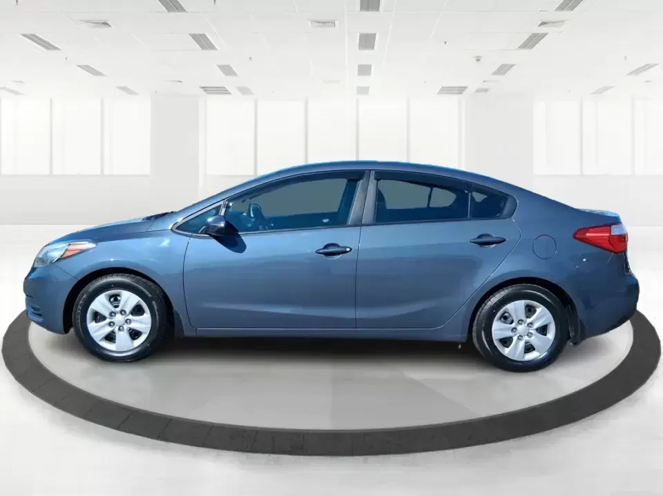 2016 Kia Forte LX (KNAFX4A63G5) with an 1.8L I-4 DOHC engine, 6-Speed Automatic transmission, located at 1184 Kauffman Ave, Fairborn, OH, 45324, (937) 908-9800, 39.807072, -84.030914 - Need a dependable commuter that still feels comfortable for weekend plans around the Miami Valley? This **2016 Kia Forte LX** in **Steel Blue Metallic** is a smart, budget-friendly sedan that fits real life in **Fairborn, Ohio**-whether you're driving to Wright-Patterson AFB, heading to class, or cr - Photo#5
