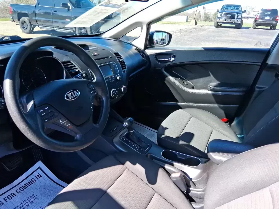 2016 Kia Forte LX (KNAFX4A63G5) with an 1.8L I-4 DOHC engine, 6-Speed Automatic transmission, located at 1184 Kauffman Ave, Fairborn, OH, 45324, (937) 908-9800, 39.807072, -84.030914 - Need a dependable commuter that still feels comfortable for weekend plans around the Miami Valley? This **2016 Kia Forte LX** in **Steel Blue Metallic** is a smart, budget-friendly sedan that fits real life in **Fairborn, Ohio**-whether you're driving to Wright-Patterson AFB, heading to class, or cr - Photo#9