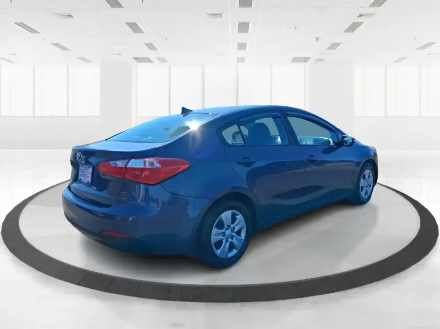 2016 Kia Forte LX (KNAFX4A63G5) with an 1.8L I-4 DOHC engine, 6-Speed Automatic transmission, located at 1951 S Dayton Lakeview Rd., New Carlisle, OH, 45344, (937) 908-9800, 39.890999, -84.050255 - Need a dependable commuter that still feels comfortable for weekend plans around the Miami Valley? This **2016 Kia Forte LX** in **Steel Blue Metallic** is a smart, budget-friendly sedan that fits real life in **Fairborn, Ohio**-whether you're driving to Wright-Patterson AFB, heading to class, or cr - Photo#2