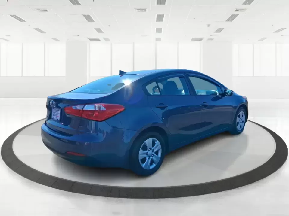 2016 Kia Forte LX (KNAFX4A63G5) with an 1.8L I-4 DOHC engine, 6-Speed Automatic transmission, located at 1951 S Dayton Lakeview Rd., New Carlisle, OH, 45344, (937) 908-9800, 39.890999, -84.050255 - Need a dependable commuter that still feels comfortable for weekend plans around the Miami Valley? This **2016 Kia Forte LX** in **Steel Blue Metallic** is a smart, budget-friendly sedan that fits real life in **Fairborn, Ohio**-whether you're driving to Wright-Patterson AFB, heading to class, or cr - Photo#2