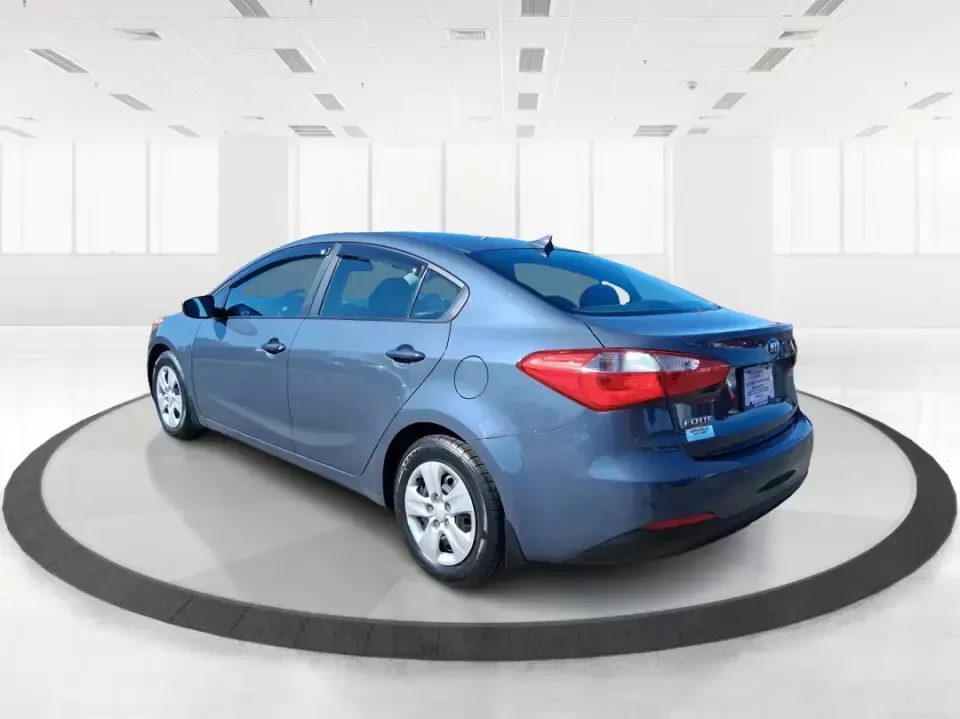 2016 Kia Forte LX (KNAFX4A63G5) with an 1.8L I-4 DOHC engine, 6-Speed Automatic transmission, located at 1951 S Dayton Lakeview Rd., New Carlisle, OH, 45344, (937) 908-9800, 39.890999, -84.050255 - Need a dependable commuter that still feels comfortable for weekend plans around the Miami Valley? This **2016 Kia Forte LX** in **Steel Blue Metallic** is a smart, budget-friendly sedan that fits real life in **Fairborn, Ohio**-whether you're driving to Wright-Patterson AFB, heading to class, or cr - Photo#4