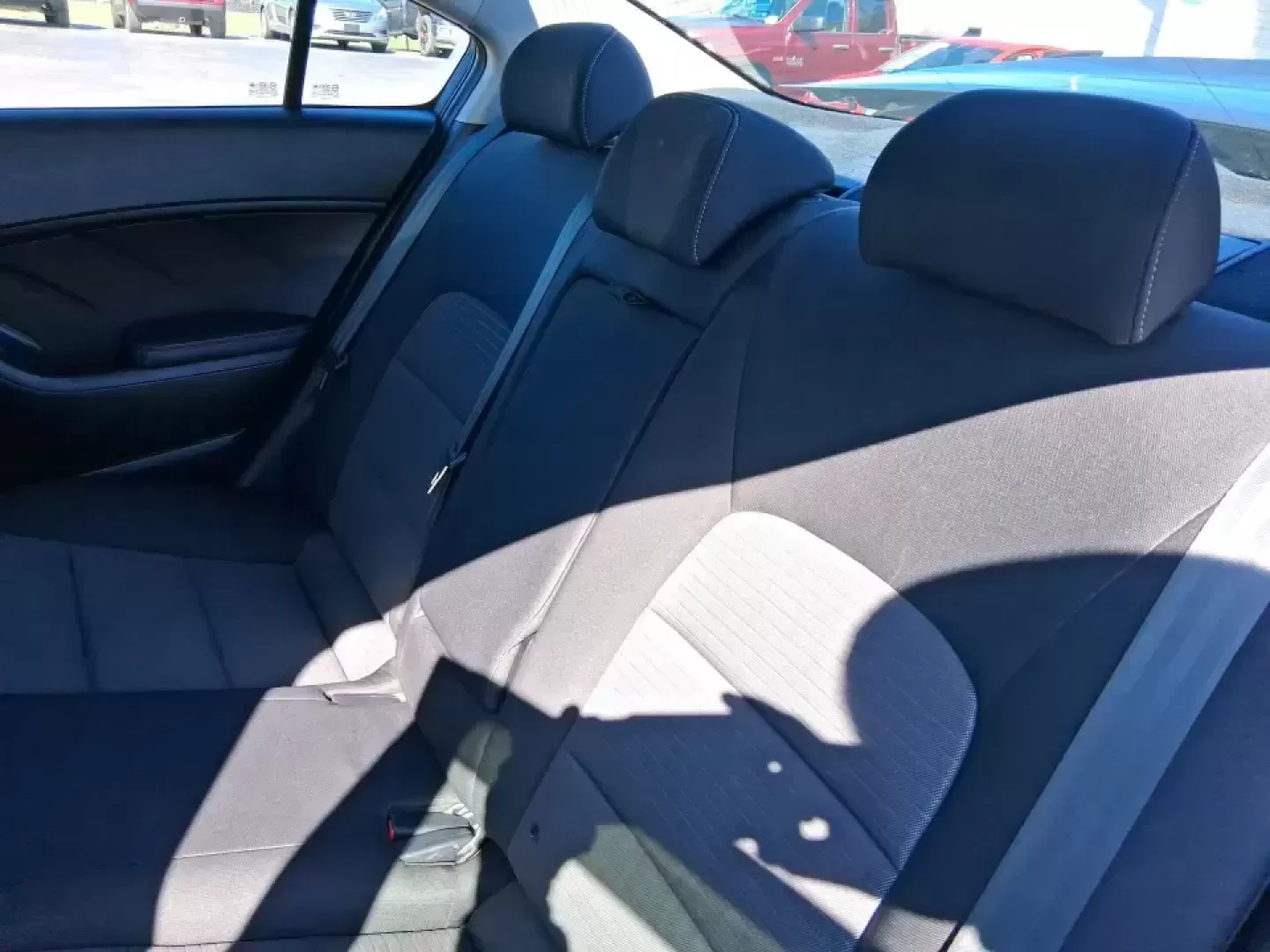 2016 Kia Forte LX (KNAFX4A63G5) with an 1.8L I-4 DOHC engine, 6-Speed Automatic transmission, located at 1951 S Dayton Lakeview Rd., New Carlisle, OH, 45344, (937) 908-9800, 39.890999, -84.050255 - Need a dependable commuter that still feels comfortable for weekend plans around the Miami Valley? This **2016 Kia Forte LX** in **Steel Blue Metallic** is a smart, budget-friendly sedan that fits real life in **Fairborn, Ohio**-whether you're driving to Wright-Patterson AFB, heading to class, or cr - Photo#10