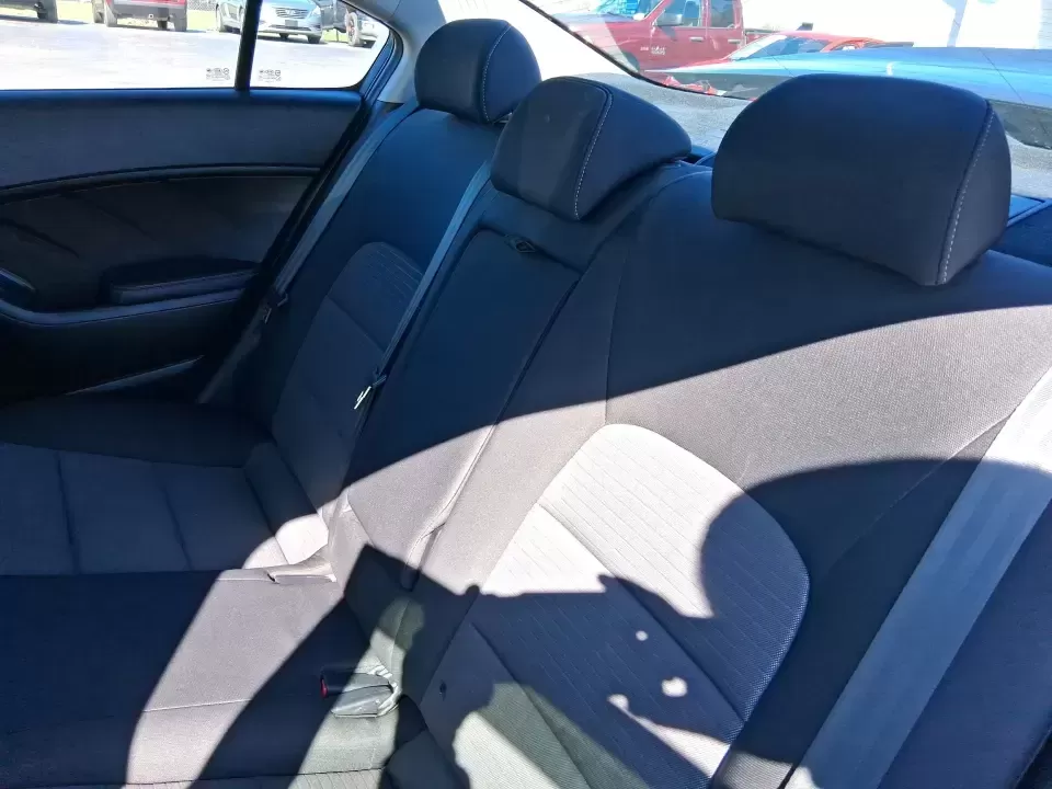 2016 Kia Forte LX (KNAFX4A63G5) with an 1.8L I-4 DOHC engine, 6-Speed Automatic transmission, located at 1951 S Dayton Lakeview Rd., New Carlisle, OH, 45344, (937) 908-9800, 39.890999, -84.050255 - Need a dependable commuter that still feels comfortable for weekend plans around the Miami Valley? This **2016 Kia Forte LX** in **Steel Blue Metallic** is a smart, budget-friendly sedan that fits real life in **Fairborn, Ohio**-whether you're driving to Wright-Patterson AFB, heading to class, or cr - Photo#10