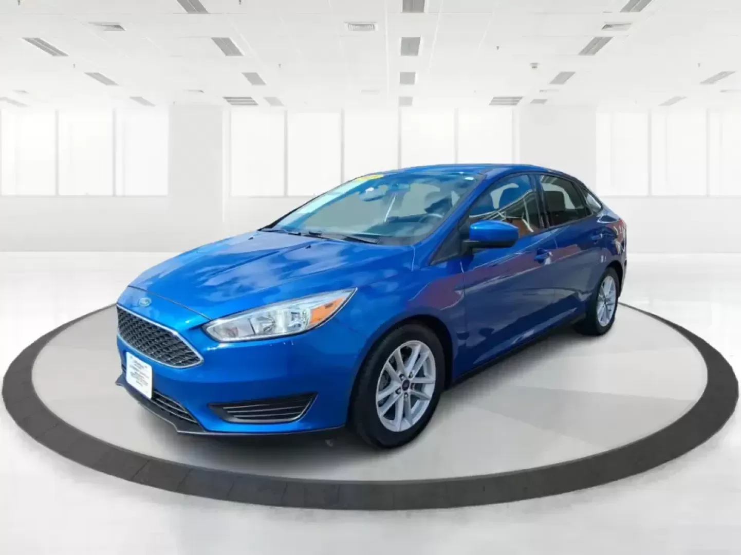 2018 Ford Focus SE (1FADP3FE4JL) with an 1.0L L3 engine, Automatic transmission, located at 1951 S Dayton Lakeview Rd., New Carlisle, OH, 45344, (937) 908-9800, 39.890999, -84.050255 - Need a dependable commuter that's easy to park downtown, comfortable on I70, and efficient enough for everyday errands from Meijer runs to school drop-offs? This 2018 Ford Focus SE sedan is a smart, budget-friendly choice for life in and around New Carlisle, offering modern tech, confidence-inspirin - Photo#8