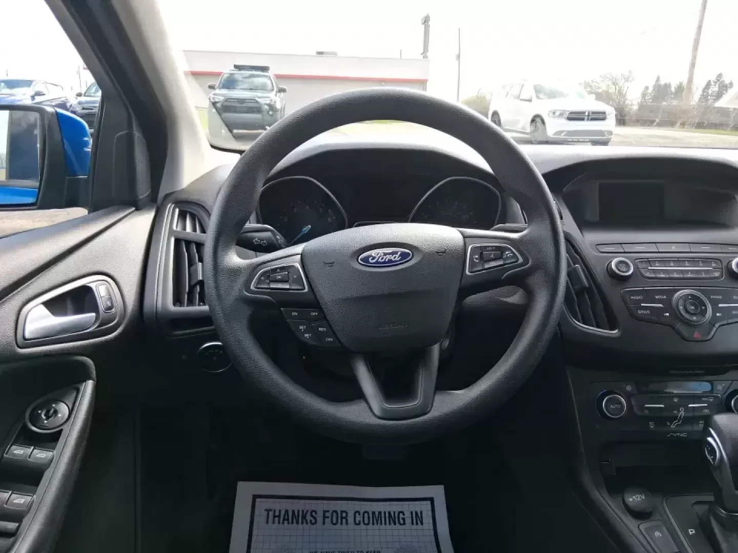 2018 Ford Focus SE (1FADP3FE4JL) with an 1.0L L3 engine, Automatic transmission, located at 1951 S Dayton Lakeview Rd., New Carlisle, OH, 45344, (937) 908-9800, 39.890999, -84.050255 - Need a dependable commuter that's easy to park downtown, comfortable on I70, and efficient enough for everyday errands from Meijer runs to school drop-offs? This 2018 Ford Focus SE sedan is a smart, budget-friendly choice for life in and around New Carlisle, offering modern tech, confidence-inspirin - Photo#16