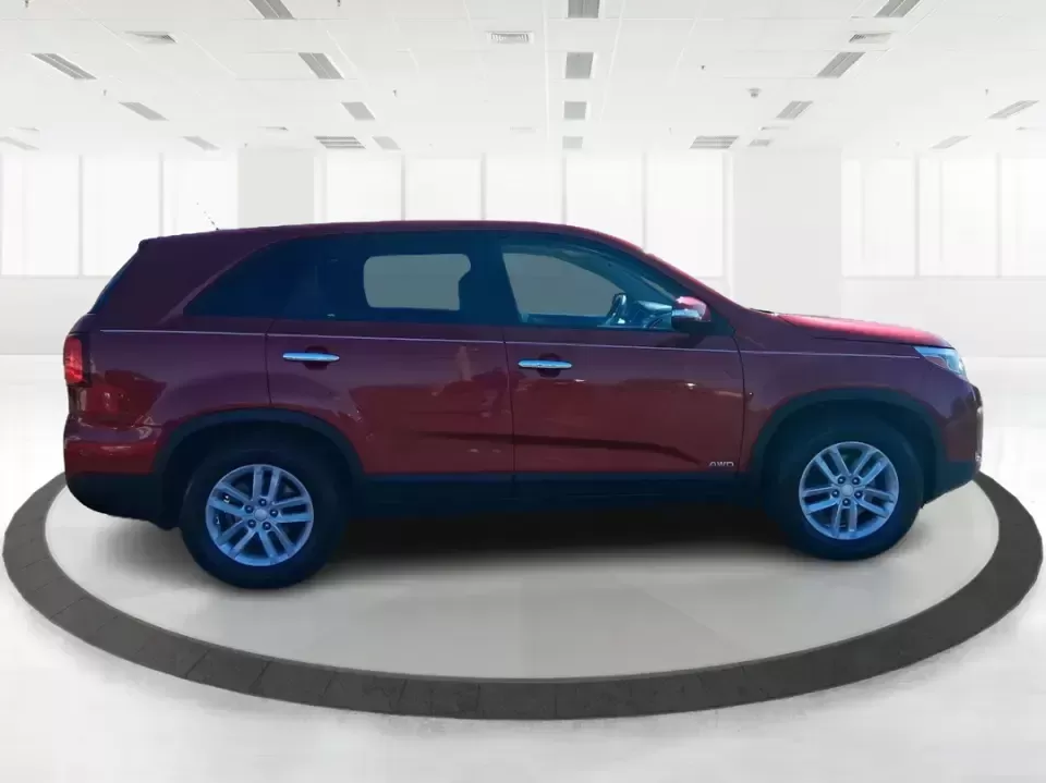2015 Kia Sorento LX (5XYKTCA67FG) with an 2.4L I-4 gasoline direct injection engine, 6-Speed Automatic transmission, located at 1951 S Dayton Lakeview Rd., New Carlisle, OH, 45344, (937) 908-9800, 39.890999, -84.050255 - Weekend road trips to John Bryan State Park, busy school mornings, or a long commute down I70-this 2015 Kia Sorento LX is the kind of SUV that fits real life in the Miami Valley. Finished in eye-catching Remington Red Metallic, it's a practical, confidence-inspiring choice for growing families, outd - Photo#1