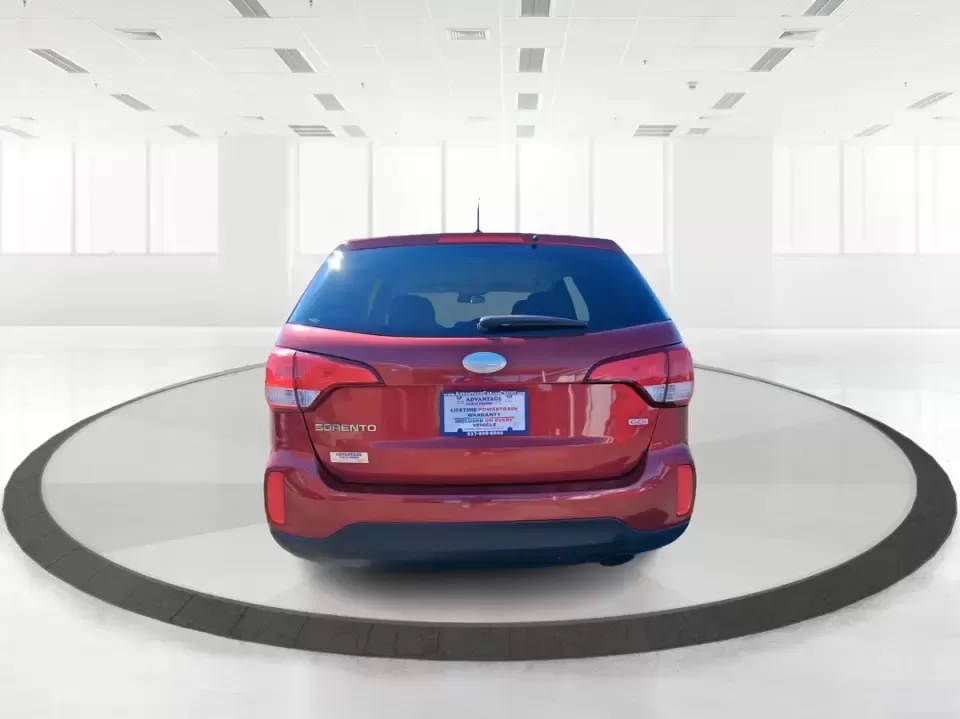 2015 Kia Sorento LX (5XYKTCA67FG) with an 2.4L I-4 gasoline direct injection engine, 6-Speed Automatic transmission, located at 1951 S Dayton Lakeview Rd., New Carlisle, OH, 45344, (937) 908-9800, 39.890999, -84.050255 - Weekend road trips to John Bryan State Park, busy school mornings, or a long commute down I70-this 2015 Kia Sorento LX is the kind of SUV that fits real life in the Miami Valley. Finished in eye-catching Remington Red Metallic, it's a practical, confidence-inspiring choice for growing families, outd - Photo#3