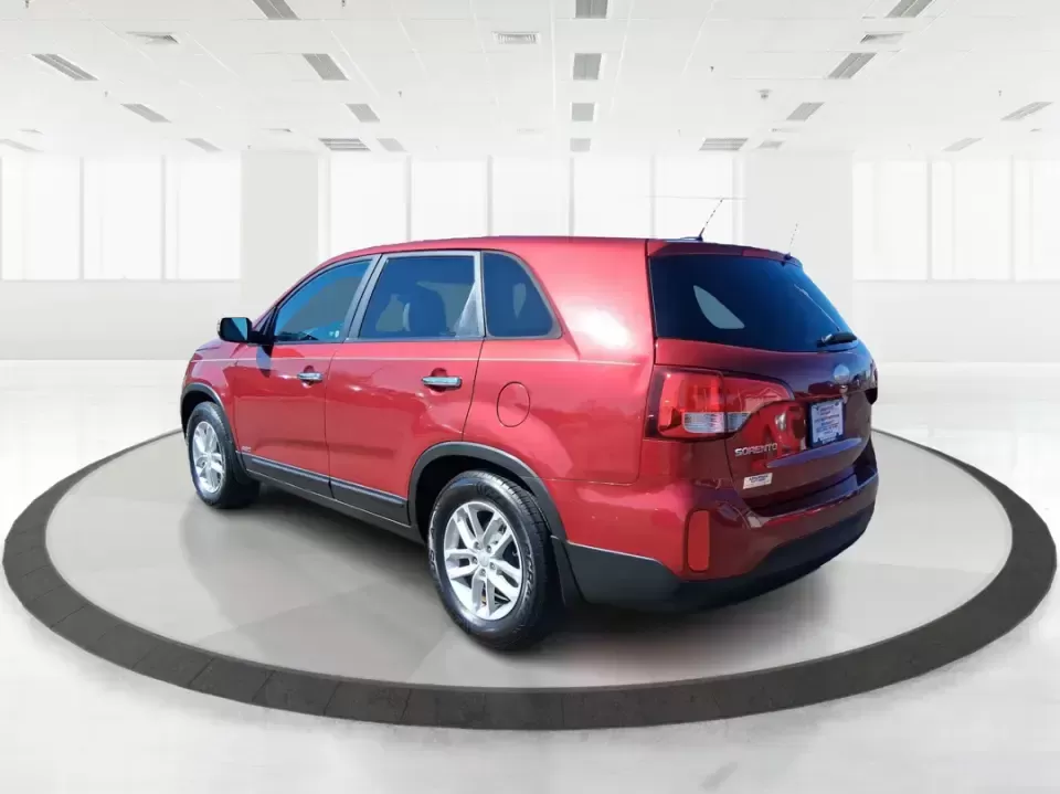 2015 Kia Sorento LX (5XYKTCA67FG) with an 2.4L I-4 gasoline direct injection engine, 6-Speed Automatic transmission, located at 1951 S Dayton Lakeview Rd., New Carlisle, OH, 45344, (937) 908-9800, 39.890999, -84.050255 - Weekend road trips to John Bryan State Park, busy school mornings, or a long commute down I70-this 2015 Kia Sorento LX is the kind of SUV that fits real life in the Miami Valley. Finished in eye-catching Remington Red Metallic, it's a practical, confidence-inspiring choice for growing families, outd - Photo#4