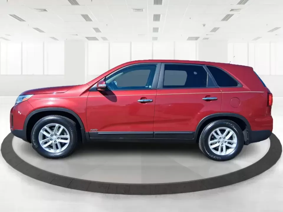 2015 Kia Sorento LX (5XYKTCA67FG) with an 2.4L I-4 gasoline direct injection engine, 6-Speed Automatic transmission, located at 1951 S Dayton Lakeview Rd., New Carlisle, OH, 45344, (937) 908-9800, 39.890999, -84.050255 - Weekend road trips to John Bryan State Park, busy school mornings, or a long commute down I70-this 2015 Kia Sorento LX is the kind of SUV that fits real life in the Miami Valley. Finished in eye-catching Remington Red Metallic, it's a practical, confidence-inspiring choice for growing families, outd - Photo#5