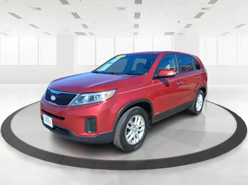 2015 Kia Sorento LX (5XYKTCA67FG) with an 2.4L I-4 gasoline direct injection engine, 6-Speed Automatic transmission, located at 1951 S Dayton Lakeview Rd., New Carlisle, OH, 45344, (937) 908-9800, 39.890999, -84.050255 - Weekend road trips to John Bryan State Park, busy school mornings, or a long commute down I70-this 2015 Kia Sorento LX is the kind of SUV that fits real life in the Miami Valley. Finished in eye-catching Remington Red Metallic, it's a practical, confidence-inspiring choice for growing families, outd - Photo#8