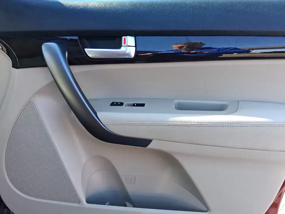 2015 Kia Sorento LX (5XYKTCA67FG) with an 2.4L I-4 gasoline direct injection engine, 6-Speed Automatic transmission, located at 1951 S Dayton Lakeview Rd., New Carlisle, OH, 45344, (937) 908-9800, 39.890999, -84.050255 - Weekend road trips to John Bryan State Park, busy school mornings, or a long commute down I70-this 2015 Kia Sorento LX is the kind of SUV that fits real life in the Miami Valley. Finished in eye-catching Remington Red Metallic, it's a practical, confidence-inspiring choice for growing families, outd - Photo#18