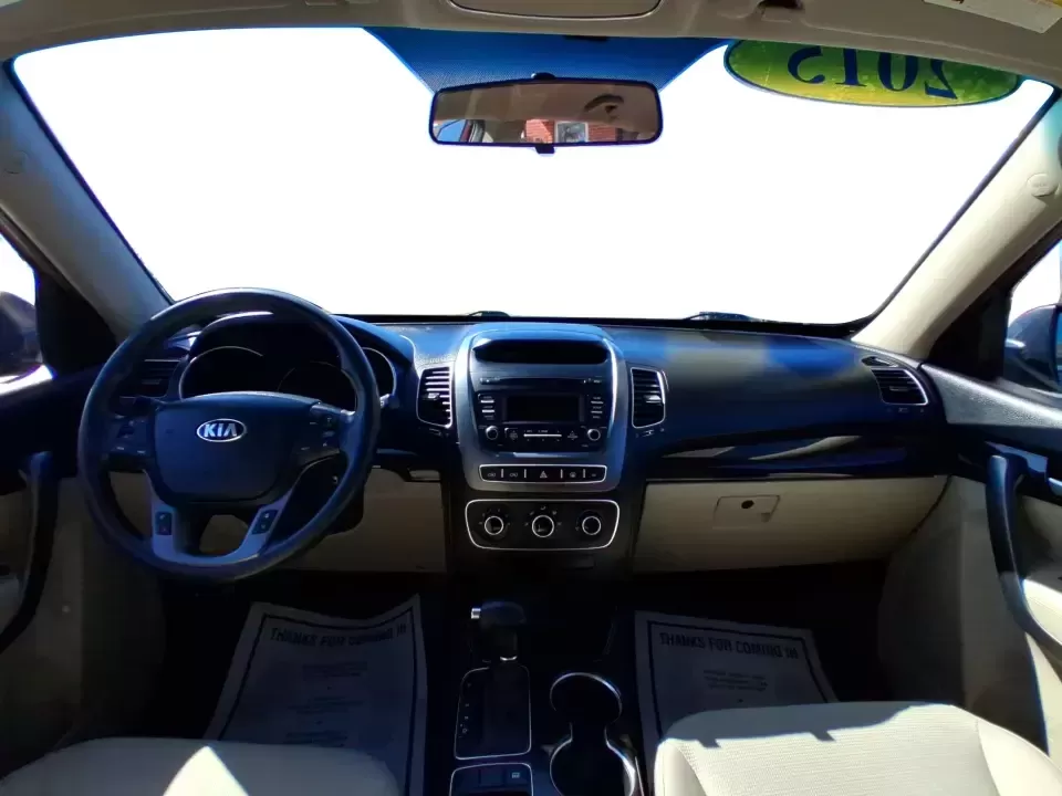 2015 Kia Sorento LX (5XYKTCA67FG) with an 2.4L I-4 gasoline direct injection engine, 6-Speed Automatic transmission, located at 1951 S Dayton Lakeview Rd., New Carlisle, OH, 45344, (937) 908-9800, 39.890999, -84.050255 - Weekend road trips to John Bryan State Park, busy school mornings, or a long commute down I70-this 2015 Kia Sorento LX is the kind of SUV that fits real life in the Miami Valley. Finished in eye-catching Remington Red Metallic, it's a practical, confidence-inspiring choice for growing families, outd - Photo#19