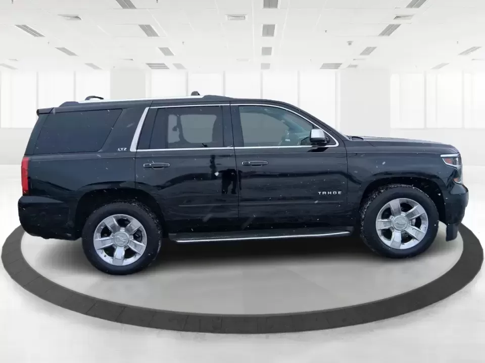 2015 Chevrolet Tahoe LTZ (1GNSKCKC9FR) with an EcoTec3 5.3L V-8 gasoline direct injection engine, 6-Speed Automatic transmission, located at 8750 N County Rd 25A, Piqua, OH, 45356, (937) 908-9800, 40.164391, -84.232513 - Big family weekend at Indian Lake, a road-trip up I-75, or a daily commute with room for coworkers and gear-this 2015 Chevrolet Tahoe LTZ 4WD is built for the kind of life that doesn't fit in a small SUV. Finished in sleek Black and powered by the EcoTec3 5.3L V8 with a smooth 6-speed automatic tran - Photo#1