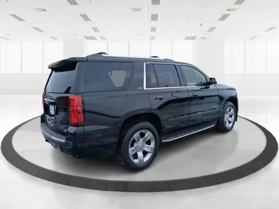 2015 Chevrolet Tahoe LTZ (1GNSKCKC9FR) with an EcoTec3 5.3L V-8 gasoline direct injection engine, 6-Speed Automatic transmission, located at 8750 N County Rd 25A, Piqua, OH, 45356, (937) 908-9800, 40.164391, -84.232513 - Big family weekend at Indian Lake, a road-trip up I-75, or a daily commute with room for coworkers and gear-this 2015 Chevrolet Tahoe LTZ 4WD is built for the kind of life that doesn't fit in a small SUV. Finished in sleek Black and powered by the EcoTec3 5.3L V8 with a smooth 6-speed automatic tran - Photo#2