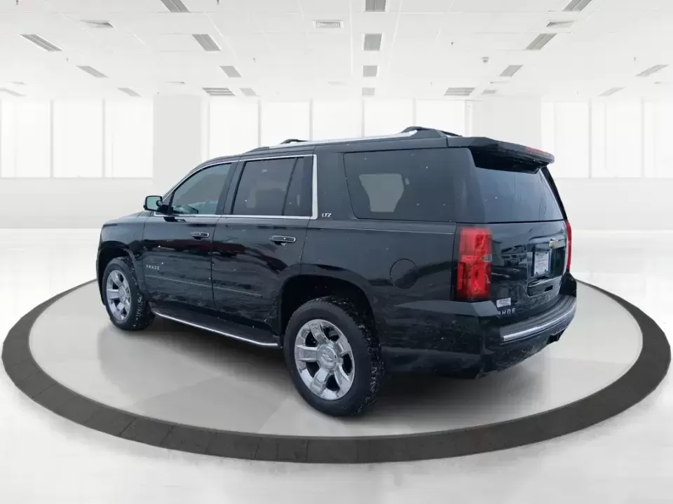 2015 Chevrolet Tahoe LTZ (1GNSKCKC9FR) with an EcoTec3 5.3L V-8 gasoline direct injection engine, 6-Speed Automatic transmission, located at 8750 N County Rd 25A, Piqua, OH, 45356, (937) 908-9800, 40.164391, -84.232513 - Big family weekend at Indian Lake, a road-trip up I-75, or a daily commute with room for coworkers and gear-this 2015 Chevrolet Tahoe LTZ 4WD is built for the kind of life that doesn't fit in a small SUV. Finished in sleek Black and powered by the EcoTec3 5.3L V8 with a smooth 6-speed automatic tran - Photo#4