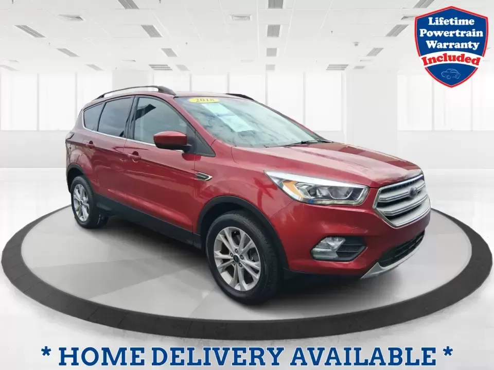 2018 Ford Escape SEL (1FMCU9HD2JU) with an 1.5L L4 DOHC 16V engine, 6A transmission, located at 401 Woodman Dr, Riverside, OH, 45431, (937) 908-9800, 39.760899, -84.123421 - Need a do-it-all SUV that can handle the weekday commute on I-675, quick school drop-offs near Wright-Patterson AFB, and spontaneous weekend getaways to Carillon Historical Park or a lap around Eastwood MetroPark? This 2018 Ford Escape SEL in Ruby Red Metallic Tinted Clearcoat is built for real-life - Photo#0