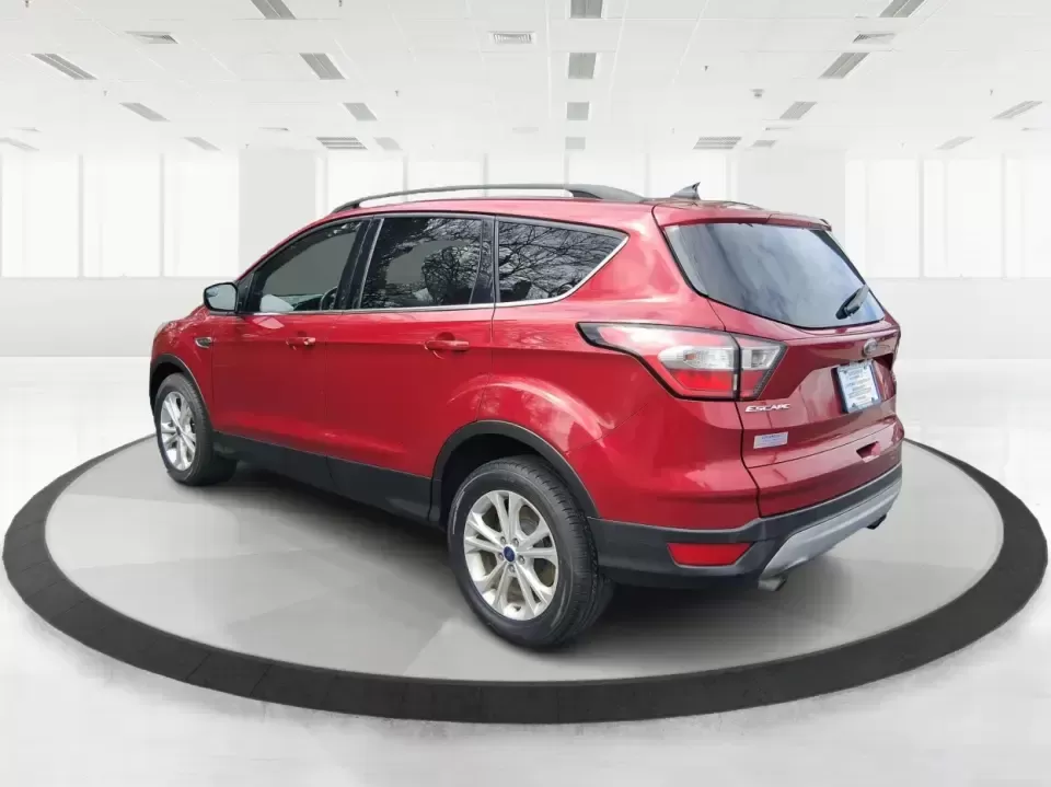 2018 Ford Escape SEL (1FMCU9HD2JU) with an 1.5L L4 DOHC 16V engine, 6A transmission, located at 401 Woodman Dr, Riverside, OH, 45431, (937) 908-9800, 39.760899, -84.123421 - Need a do-it-all SUV that can handle the weekday commute on I-675, quick school drop-offs near Wright-Patterson AFB, and spontaneous weekend getaways to Carillon Historical Park or a lap around Eastwood MetroPark? This 2018 Ford Escape SEL in Ruby Red Metallic Tinted Clearcoat is built for real-life - Photo#4