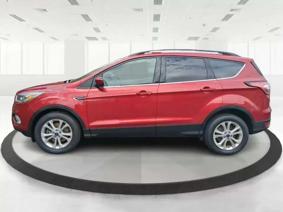 2018 Ford Escape SEL (1FMCU9HD2JU) with an 1.5L L4 DOHC 16V engine, 6A transmission, located at 401 Woodman Dr, Riverside, OH, 45431, (937) 908-9800, 39.760899, -84.123421 - Need a do-it-all SUV that can handle the weekday commute on I-675, quick school drop-offs near Wright-Patterson AFB, and spontaneous weekend getaways to Carillon Historical Park or a lap around Eastwood MetroPark? This 2018 Ford Escape SEL in Ruby Red Metallic Tinted Clearcoat is built for real-life - Photo#5