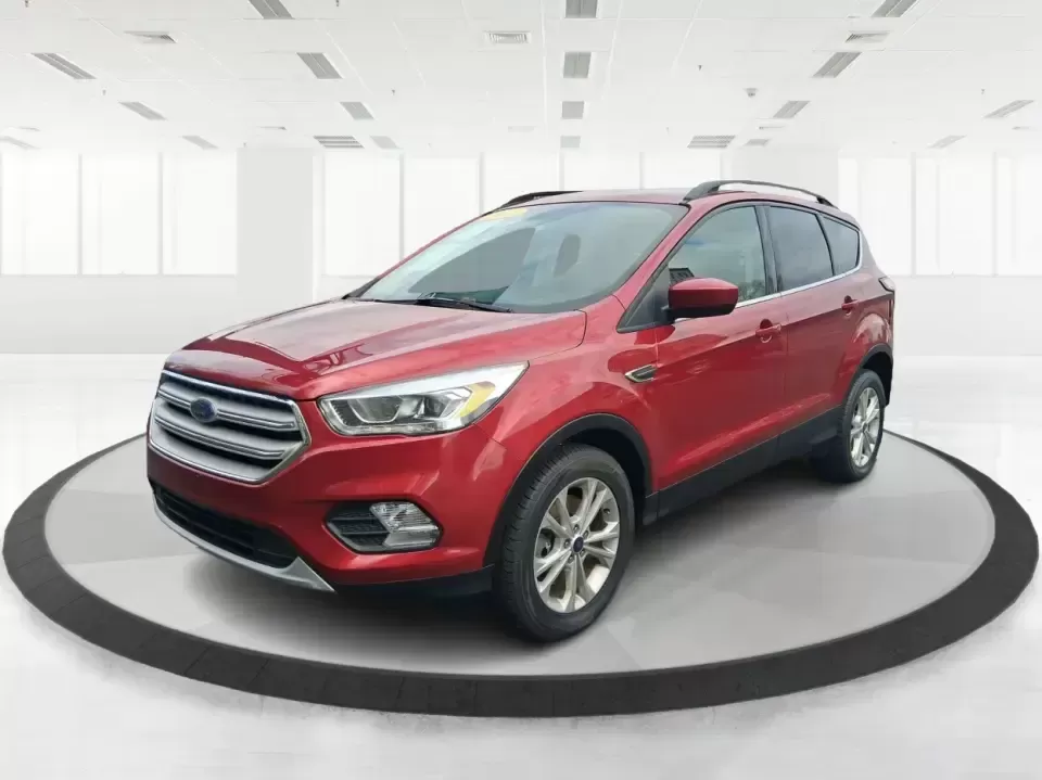 2018 Ford Escape SEL (1FMCU9HD2JU) with an 1.5L L4 DOHC 16V engine, 6A transmission, located at 401 Woodman Dr, Riverside, OH, 45431, (937) 908-9800, 39.760899, -84.123421 - Need a do-it-all SUV that can handle the weekday commute on I-675, quick school drop-offs near Wright-Patterson AFB, and spontaneous weekend getaways to Carillon Historical Park or a lap around Eastwood MetroPark? This 2018 Ford Escape SEL in Ruby Red Metallic Tinted Clearcoat is built for real-life - Photo#8