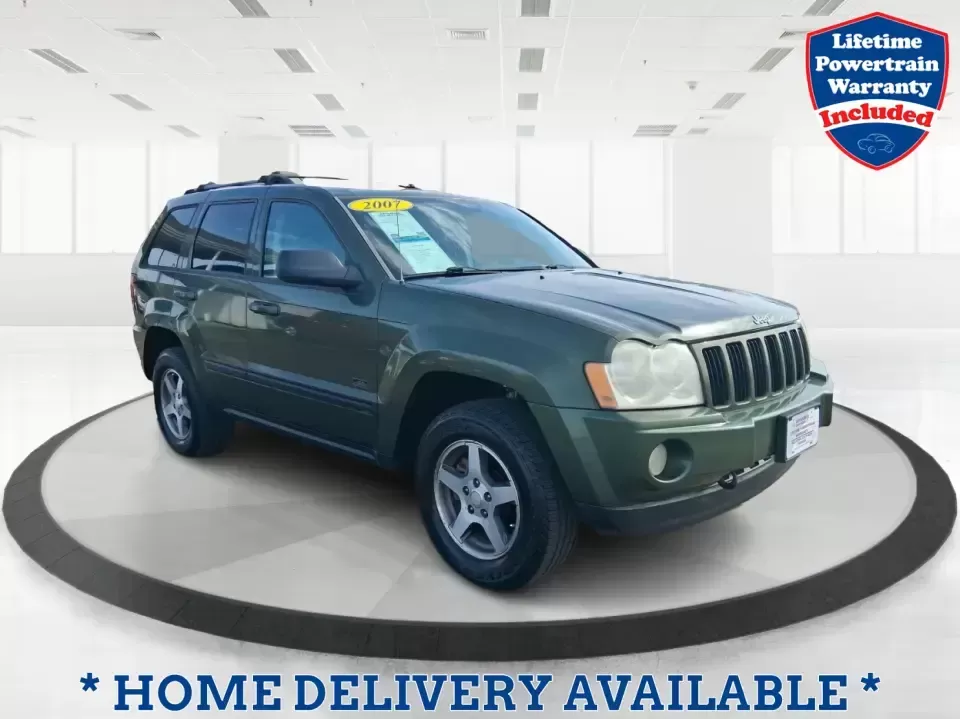 2007 Jeep Grand Cherokee Laredo (1J8GR48K47C) with an 3.7L V6 SOHC 12V engine, 5-Speed Automatic Overdrive transmission, located at 880 E. National Road, Vandalia, OH, 45377, (937) 908-9800, 39.891918, -84.183594 - Weekend getaways to the trails, winter commutes on slick Ohio roads, and family errands across town all get easier when you're in a capable SUV with true 4WD confidence. This **2007 Jeep Grand Cherokee Laredo** is built for drivers who want classic Jeep utility without giving up everyday comfort-ide - Photo#0
