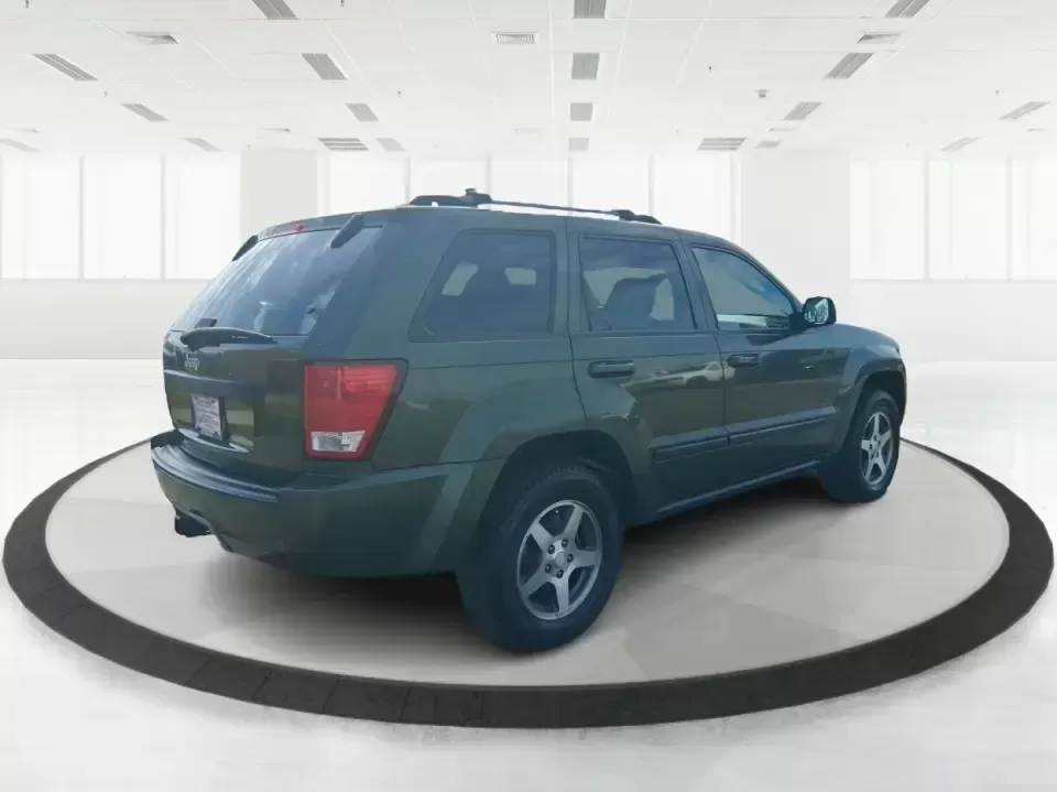 2007 Jeep Grand Cherokee Laredo (1J8GR48K47C) with an 3.7L V6 SOHC 12V engine, 5-Speed Automatic Overdrive transmission, located at 880 E. National Road, Vandalia, OH, 45377, (937) 908-9800, 39.891918, -84.183594 - Weekend getaways to the trails, winter commutes on slick Ohio roads, and family errands across town all get easier when you're in a capable SUV with true 4WD confidence. This **2007 Jeep Grand Cherokee Laredo** is built for drivers who want classic Jeep utility without giving up everyday comfort-ide - Photo#2