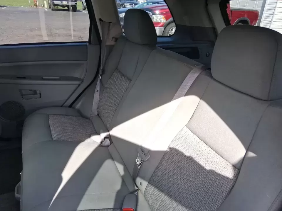 2007 Jeep Grand Cherokee Laredo (1J8GR48K47C) with an 3.7L V6 SOHC 12V engine, 5-Speed Automatic Overdrive transmission, located at 880 E. National Road, Vandalia, OH, 45377, (937) 908-9800, 39.891918, -84.183594 - Weekend getaways to the trails, winter commutes on slick Ohio roads, and family errands across town all get easier when you're in a capable SUV with true 4WD confidence. This **2007 Jeep Grand Cherokee Laredo** is built for drivers who want classic Jeep utility without giving up everyday comfort-ide - Photo#10