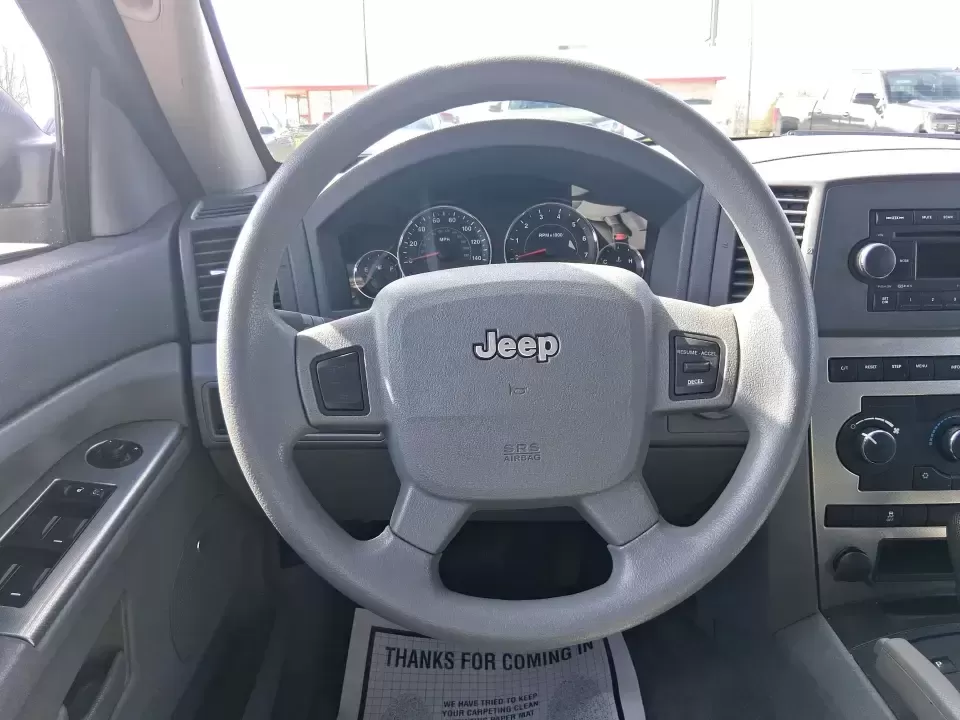 2007 Jeep Grand Cherokee Laredo (1J8GR48K47C) with an 3.7L V6 SOHC 12V engine, 5-Speed Automatic Overdrive transmission, located at 880 E. National Road, Vandalia, OH, 45377, (937) 908-9800, 39.891918, -84.183594 - Weekend getaways to the trails, winter commutes on slick Ohio roads, and family errands across town all get easier when you're in a capable SUV with true 4WD confidence. This **2007 Jeep Grand Cherokee Laredo** is built for drivers who want classic Jeep utility without giving up everyday comfort-ide - Photo#16