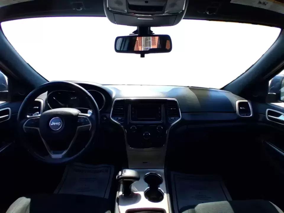 2015 Jeep Grand Cherokee Laredo (1C4RJFAG4FC) with an 3.6L V-6 DOHC engine, 8-Speed Automatic transmission, located at 1230 East Main St, Xenia, OH, 45385, (937) 908-9800, 39.688026, -83.910172 - Weekend getaways to Hocking Hills, confident winter drives to work, and comfortable family errands around town all get easier in a capable SUV like this 2015 Jeep Grand Cherokee Laredo 4WD. Finished in Maximum Steel Metallic Clearcoat, this Grand Cherokee blends rugged Jeep attitude with everyday co - Photo#21