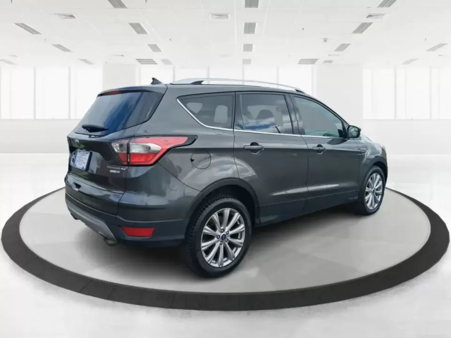 2018 Ford Escape Titanium (1FMCU9J94JU) with an EcoBoost 2L I-4 gasoline direct injection engine, 6A transmission, located at 4508 South Dixie Dr, Moraine, OH, 45439, (937) 908-9800, 39.689976, -84.218452 - Pack up the kids, load the groceries, or point the hood toward a weekend getaway-this 2018 Ford Escape Titanium is the kind of compact SUV that fits real life in Moraine. With confident capability for Ohio weather and a comfortable, tech-forward cabin, it's ideal for long commutes down I-75, quick e - Photo#2
