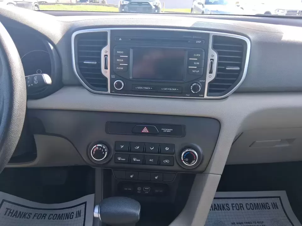 2017 Kia Sportage LX (KNDPM3AC7H7) with an Theta II 2.4L I-4 gasoline direct injection engine, 6A transmission, located at 8750 N County Rd 25A, Piqua, OH, 45356, (937) 908-9800, 40.164391, -84.232513 - Pack up the kids, load the groceries, or point the hood toward a weekend escape-this 2017 Kia Sportage LX is the kind of crossover that fits real life in West Central Ohio. With a comfortable cabin, versatile cargo space, and confident everyday drivability, it's ideal for commuters heading down I75, - Photo#13