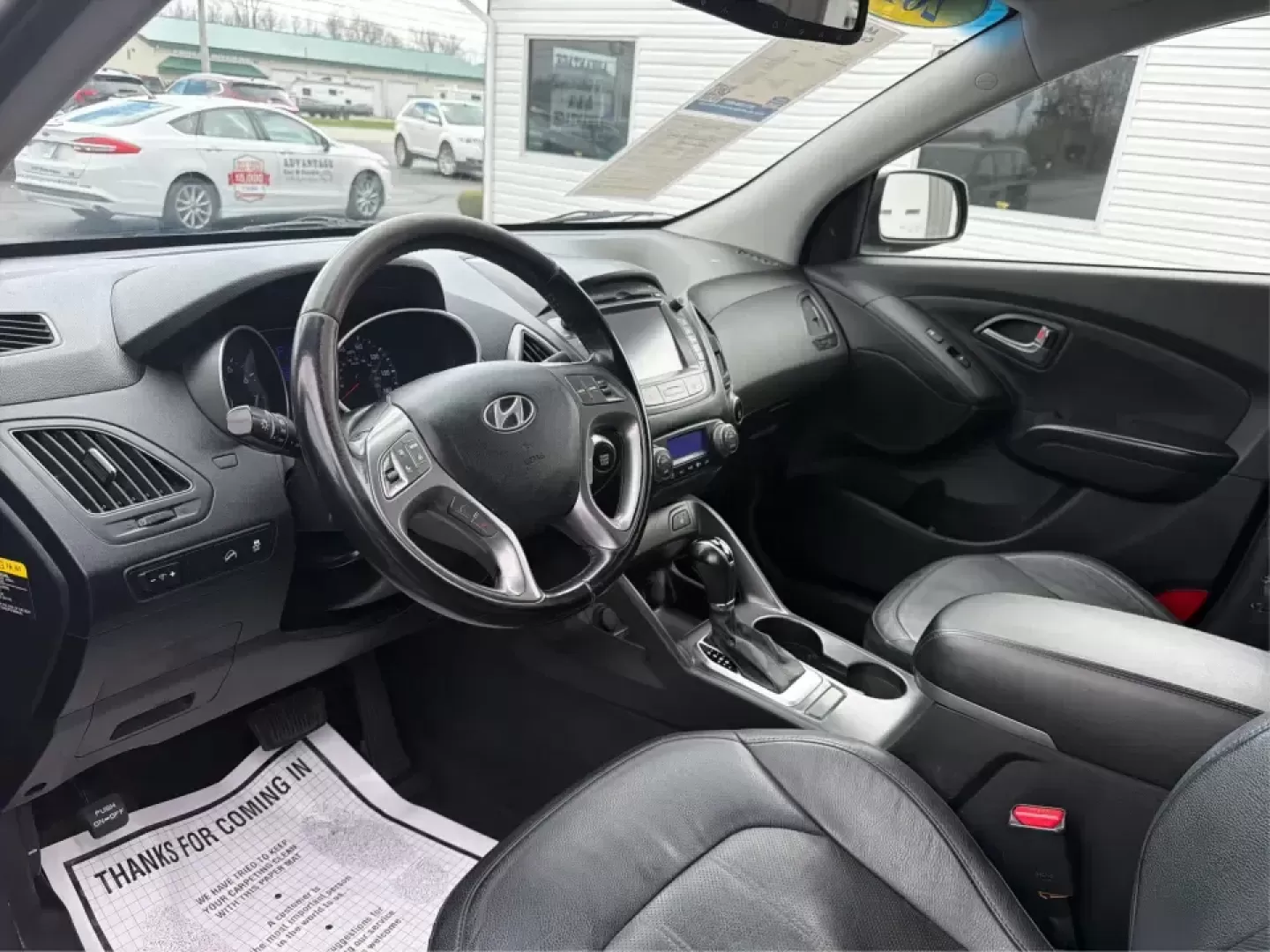 2015 Hyundai Tucson Limited (KM8JU3AG5FU) with an Theta II 2.4L I-4 gasoline direct injection engine, 6-Speed Automatic transmission, located at 8750 N County Rd 25A, Piqua, OH, 45356, (937) 908-9800, 40.164391, -84.232513 - Need a dependable SUV that fits real life-school drop-offs, long commutes up I75, and weekend getaways to Indian Lake or a quick lap around downtown Piqua? This 2015 Hyundai Tucson Limited is built for the everyday hustle with the comfort and tech that make each mile easier, whether you're running e - Photo#9