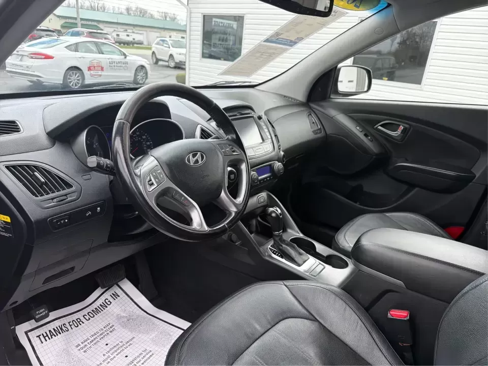 2015 Hyundai Tucson Limited (KM8JU3AG5FU) with an Theta II 2.4L I-4 gasoline direct injection engine, 6-Speed Automatic transmission, located at 8750 N County Rd 25A, Piqua, OH, 45356, (937) 908-9800, 40.164391, -84.232513 - Need a dependable SUV that fits real life-school drop-offs, long commutes up I75, and weekend getaways to Indian Lake or a quick lap around downtown Piqua? This 2015 Hyundai Tucson Limited is built for the everyday hustle with the comfort and tech that make each mile easier, whether you're running e - Photo#9